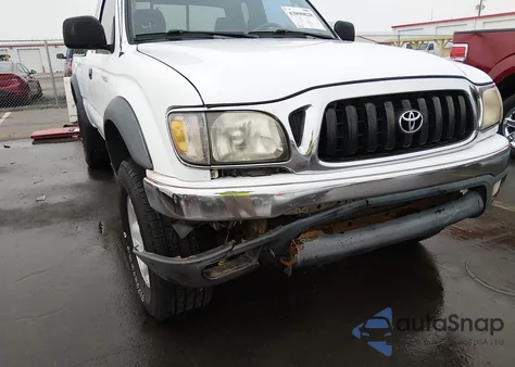 2002 Toyota Tacoma из США, поврежденный, VIN 5TEWM72N22Z058307